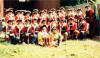 The Military Core in the brand-new uniforms of the 60th Foot ( minus breeches! ), James Permaine ( drummer ) and Dale Dye down in front, Dale Fetzer at right with flag.